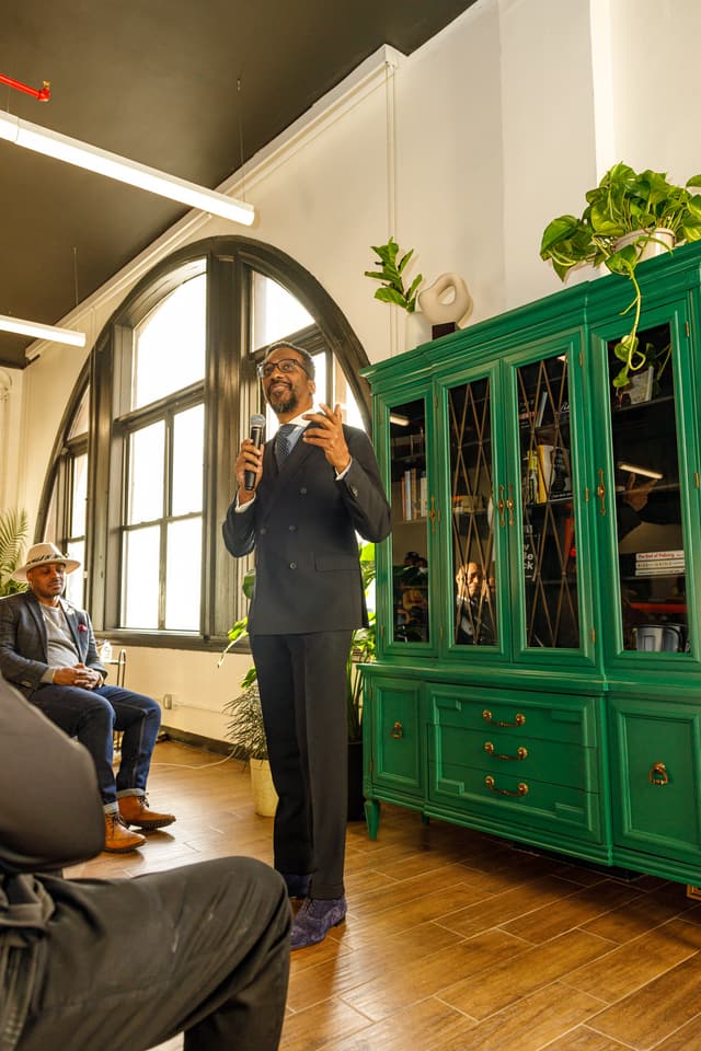A guest speaker at the Gentlemen's Factory grand opening.